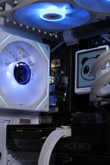 Ice Box gaming PC interior with AIO tubing and RTX graphics card