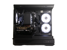 The Cub gaming PC side view through the glass, showing the RTX 5060 and tower air cooler